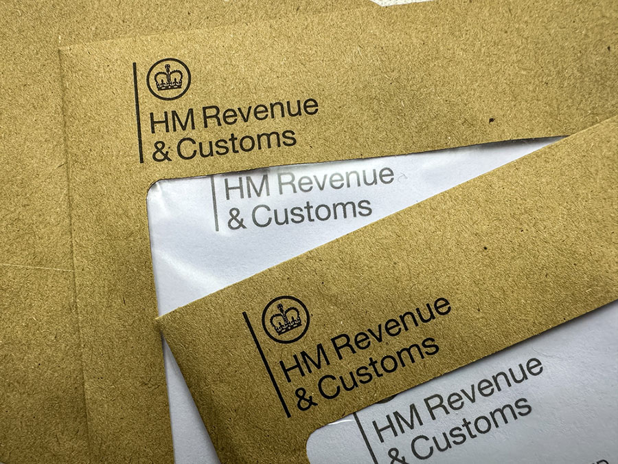 letters from HMRC spread out on a table